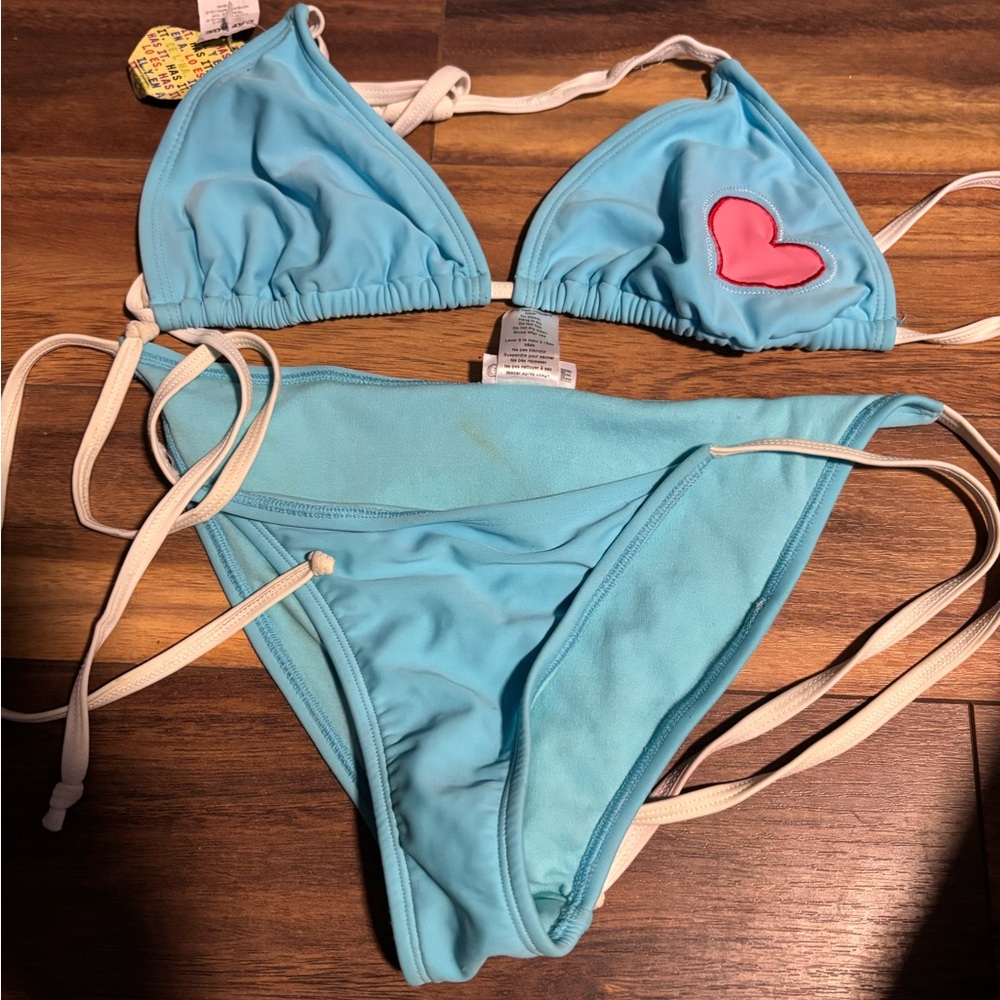 NWT vintage Garage bikini.  Top is a large and bottom is small